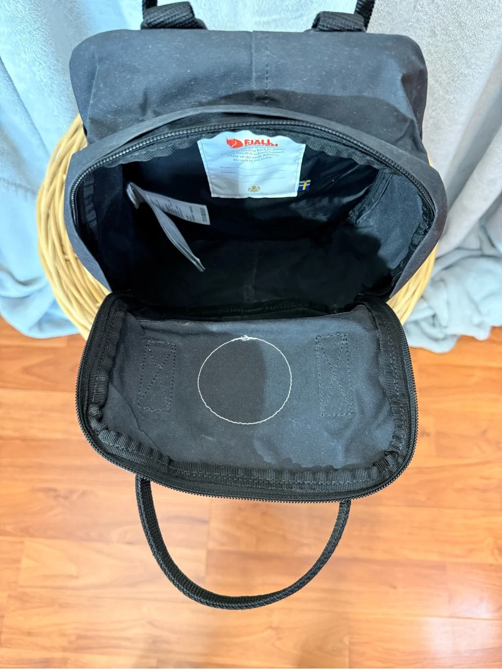 Fjallraven Kanken Mini Backpack in Black with Red Logo